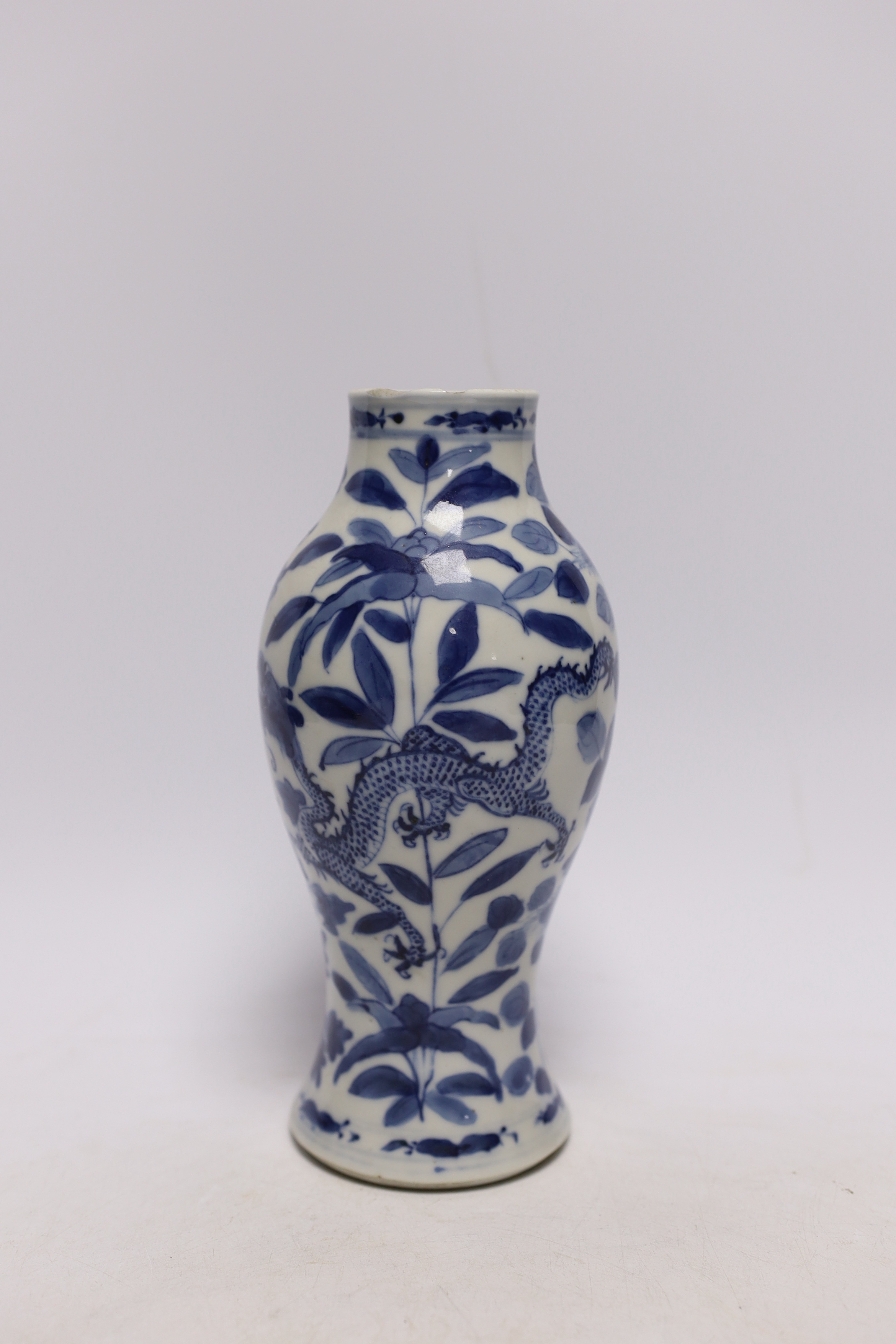 A Chinese blue and white dragon vase, Kangxi mark, late 19th century, 20.5cm high